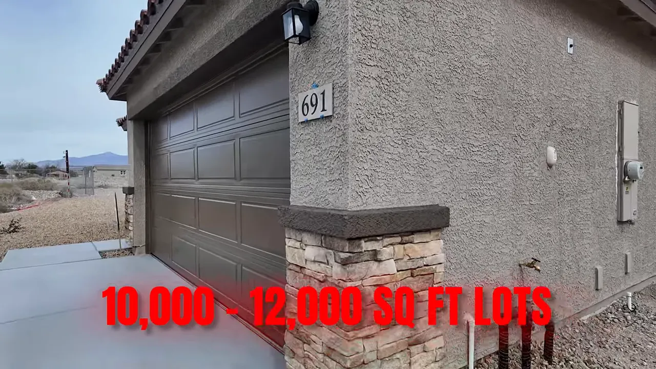 New home with text overlay showing 10,000 to 12,000 sq ft lots in Pahrump NV
