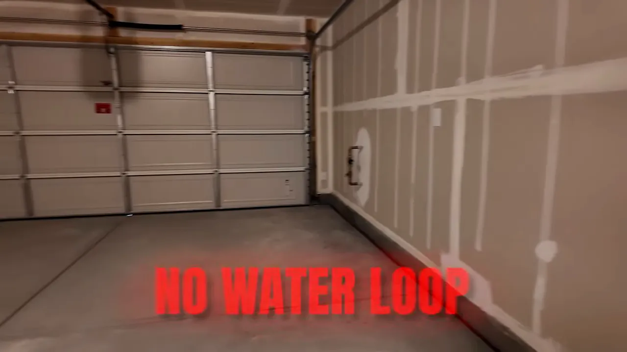 Garage floor and walls with on-screen text indicating no water loop in Pahrump, Nevada