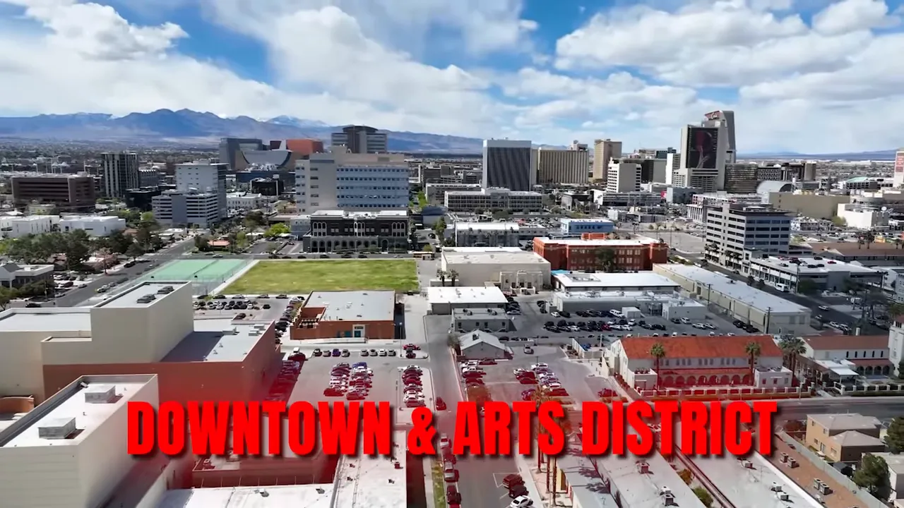 Aerial view of downtown Las Vegas and the Arts District with bold red overlay text reading 'DOWNTOWN & ARTS DISTRICT'.