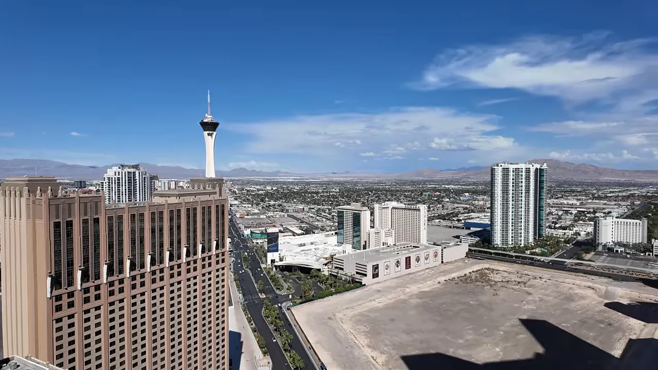 Panoramic view of the north Las Vegas Strip from Sky Las Vegas, featuring the Stratosphere Tower and nearby development sites.