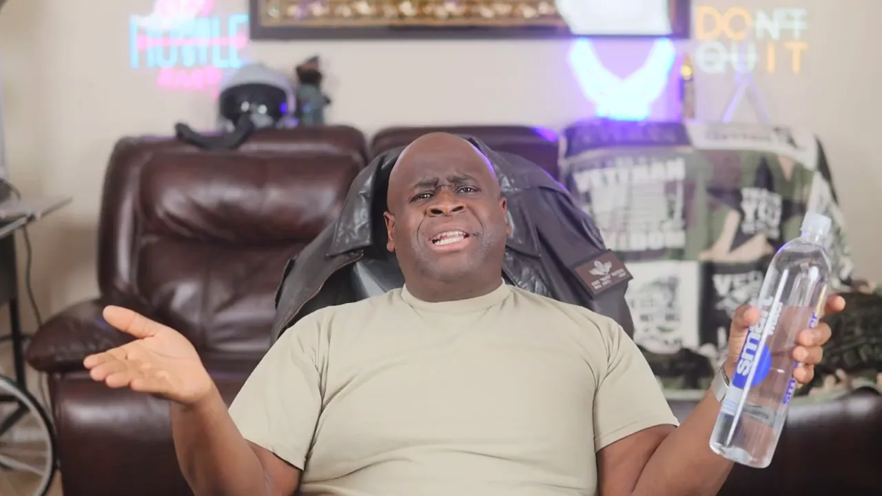 Host gesturing while explaining buyer-broker agreements, holding a water bottle