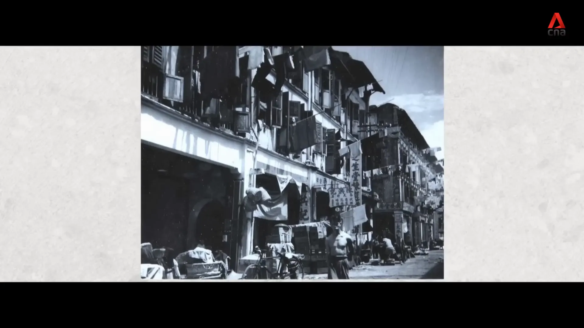 Overcrowded living conditions in post-war Singapore