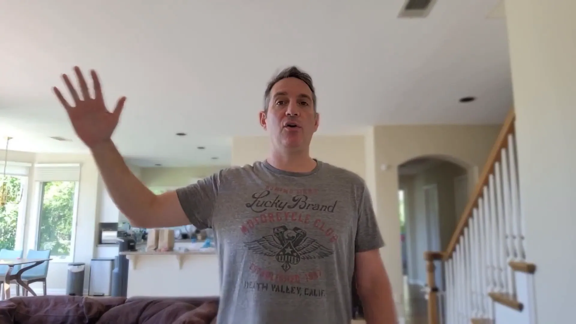 Scott showing full shoulder mobility after recovery