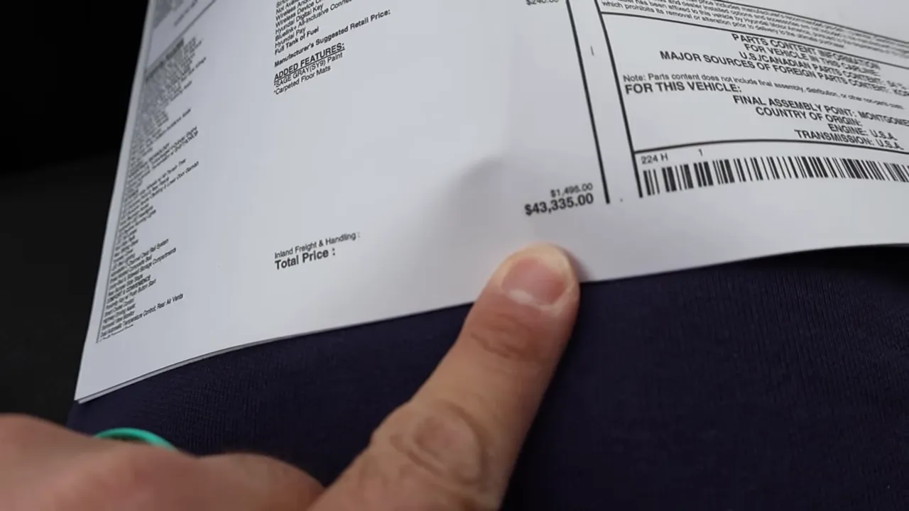 Window sticker (Monroney) close-up showing total price $43,335 for 2026 Hyundai Santa Cruz XRT