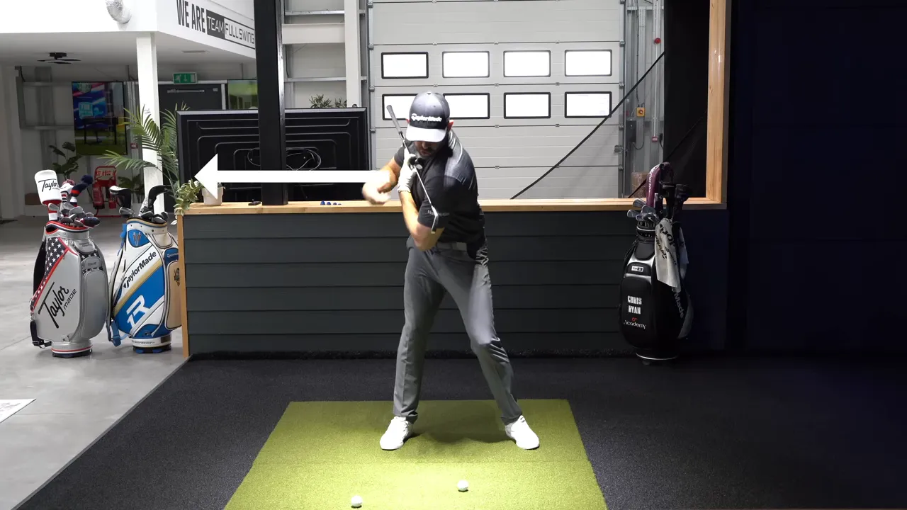 Golfer initiating the downswing with chest rotating and an arrow highlighting the torch pointing back toward the ball
