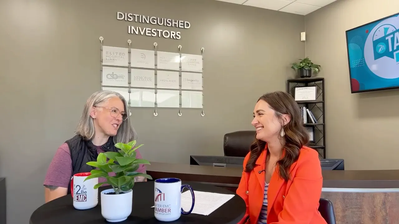 Dr. Lauren Baker and the interview host smiling during a chiropractic care discussion