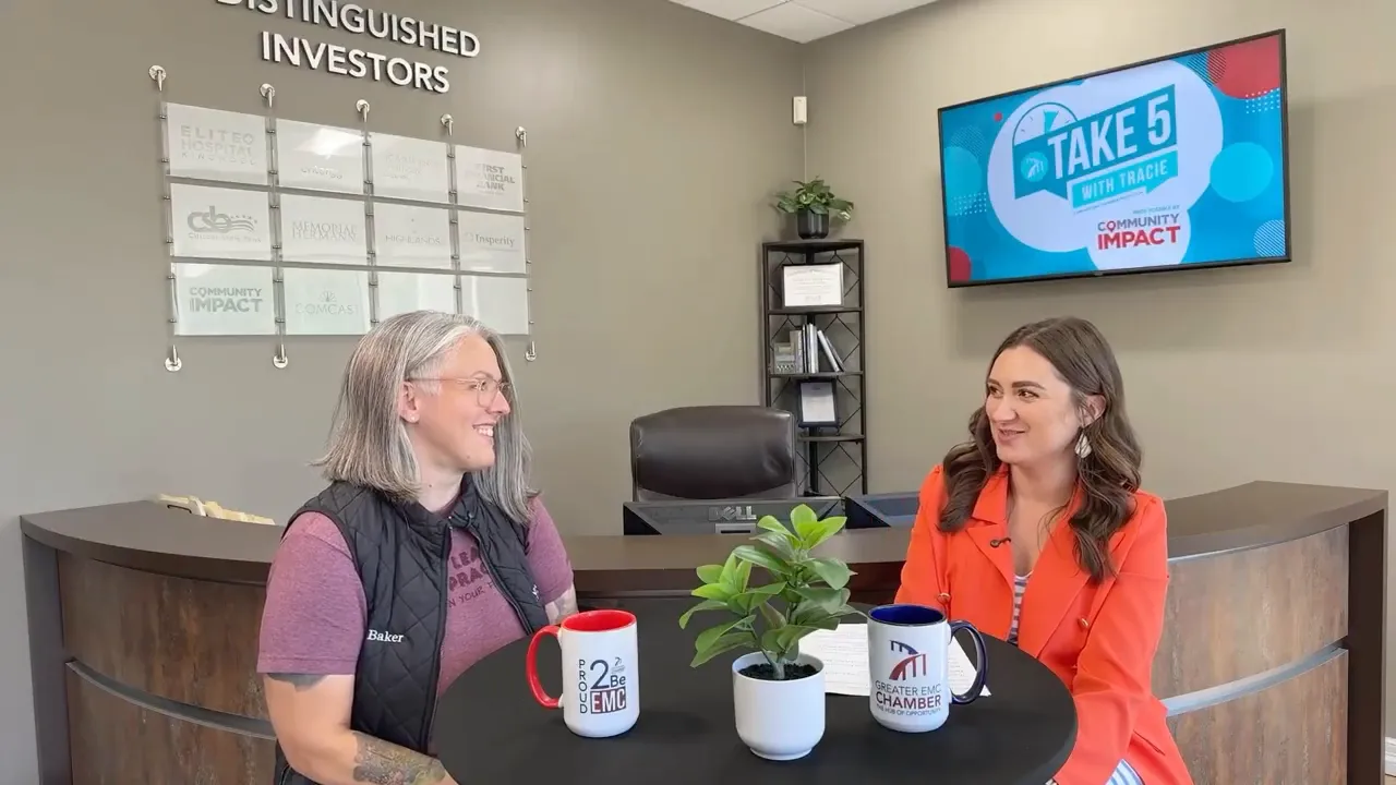 Dr. Lauren Baker and Tracie Kamenoff seated for an interview in a chiropractic office