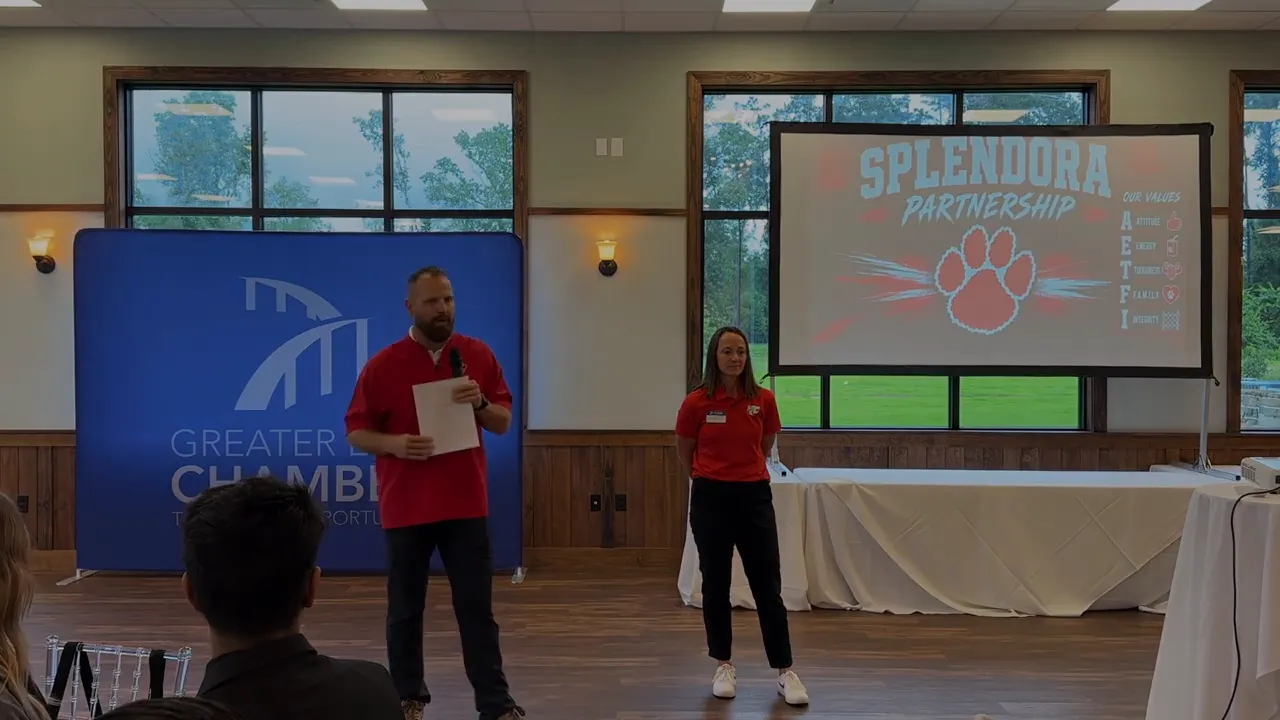Splendora Partnership slide with paw logo and values list attitude energy toughness family integrity