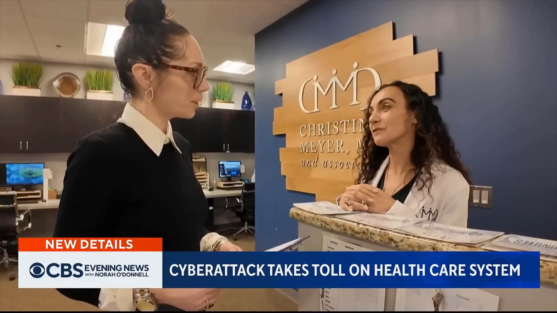 Physician discussing financial impact of data breach