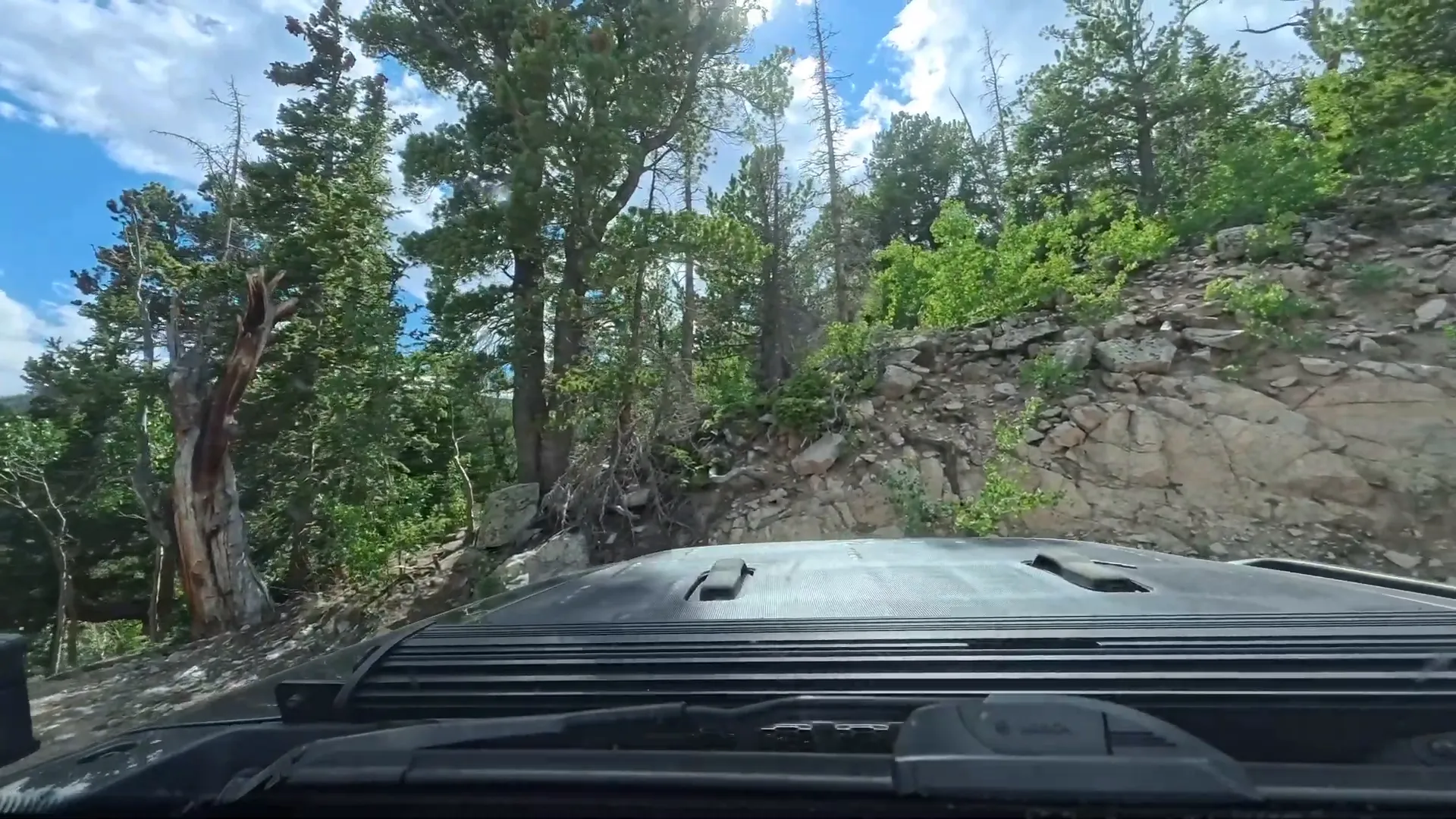 Switchback with rocky surface; tight turning radius needed