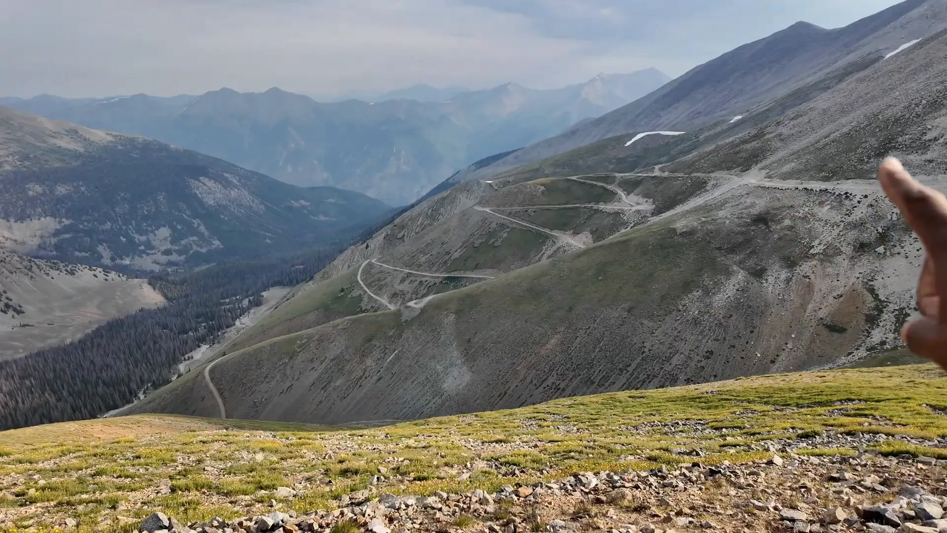 Looking back at the long switchbacks that climb toward tree line