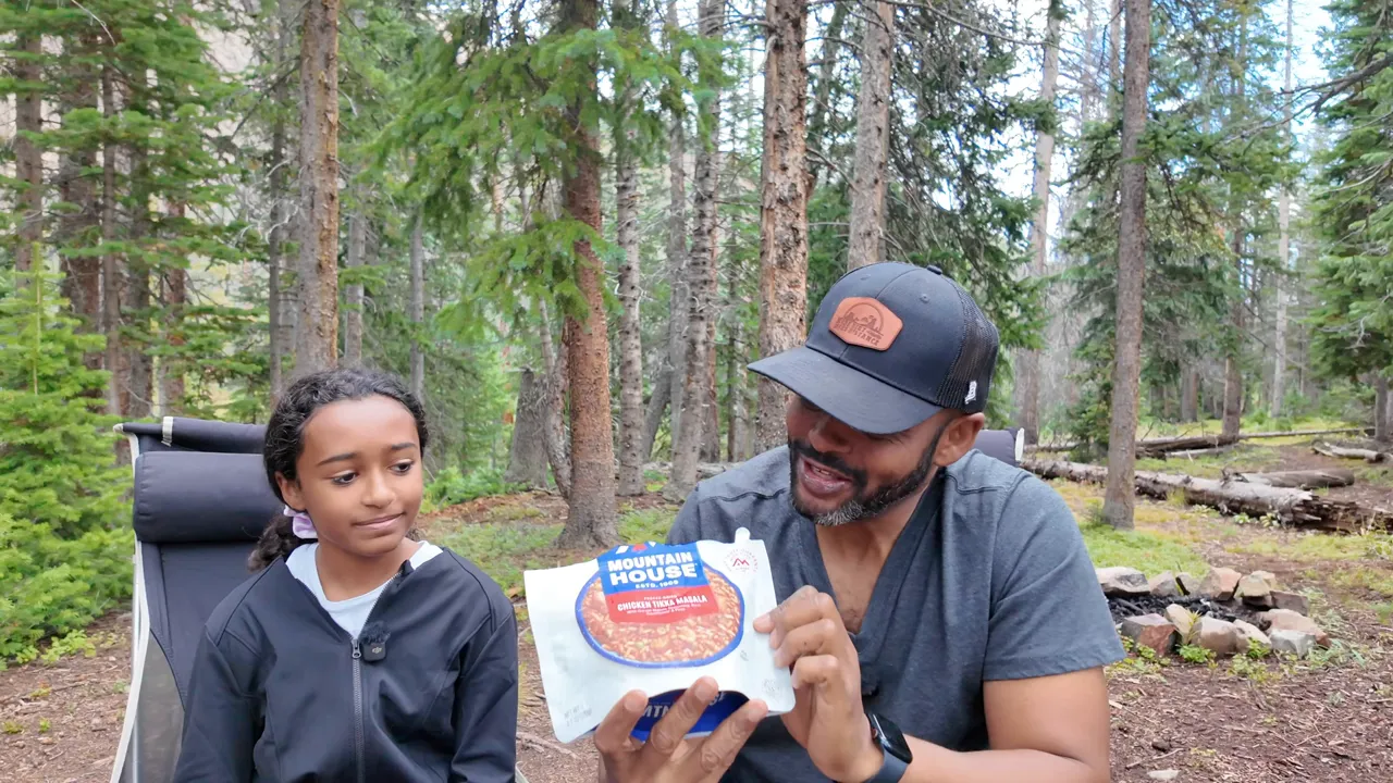 Chicken tikka masala with rice cauliflower and peas