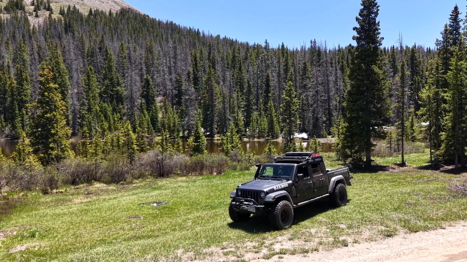 Second lake campsite with melting snow nearby