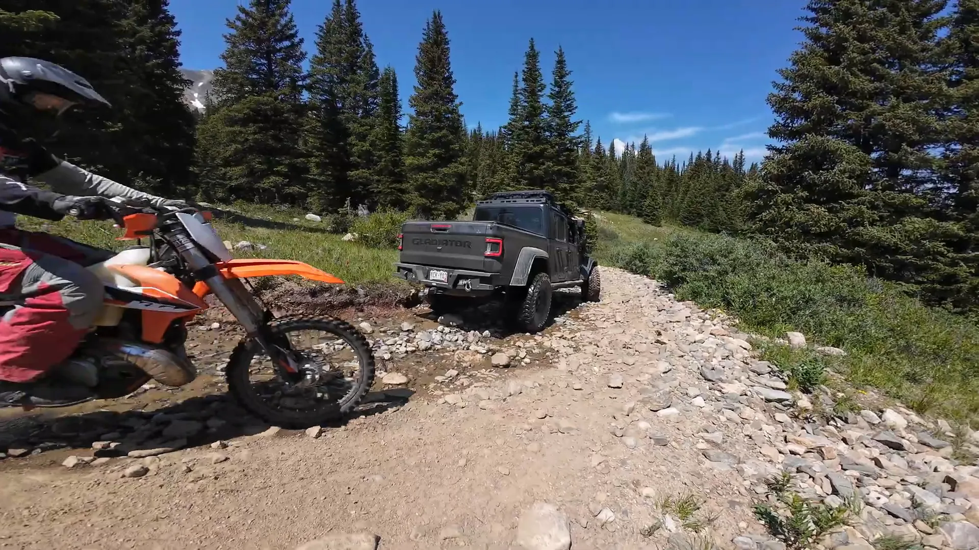 Dirt bikers enjoying the trail during the descent