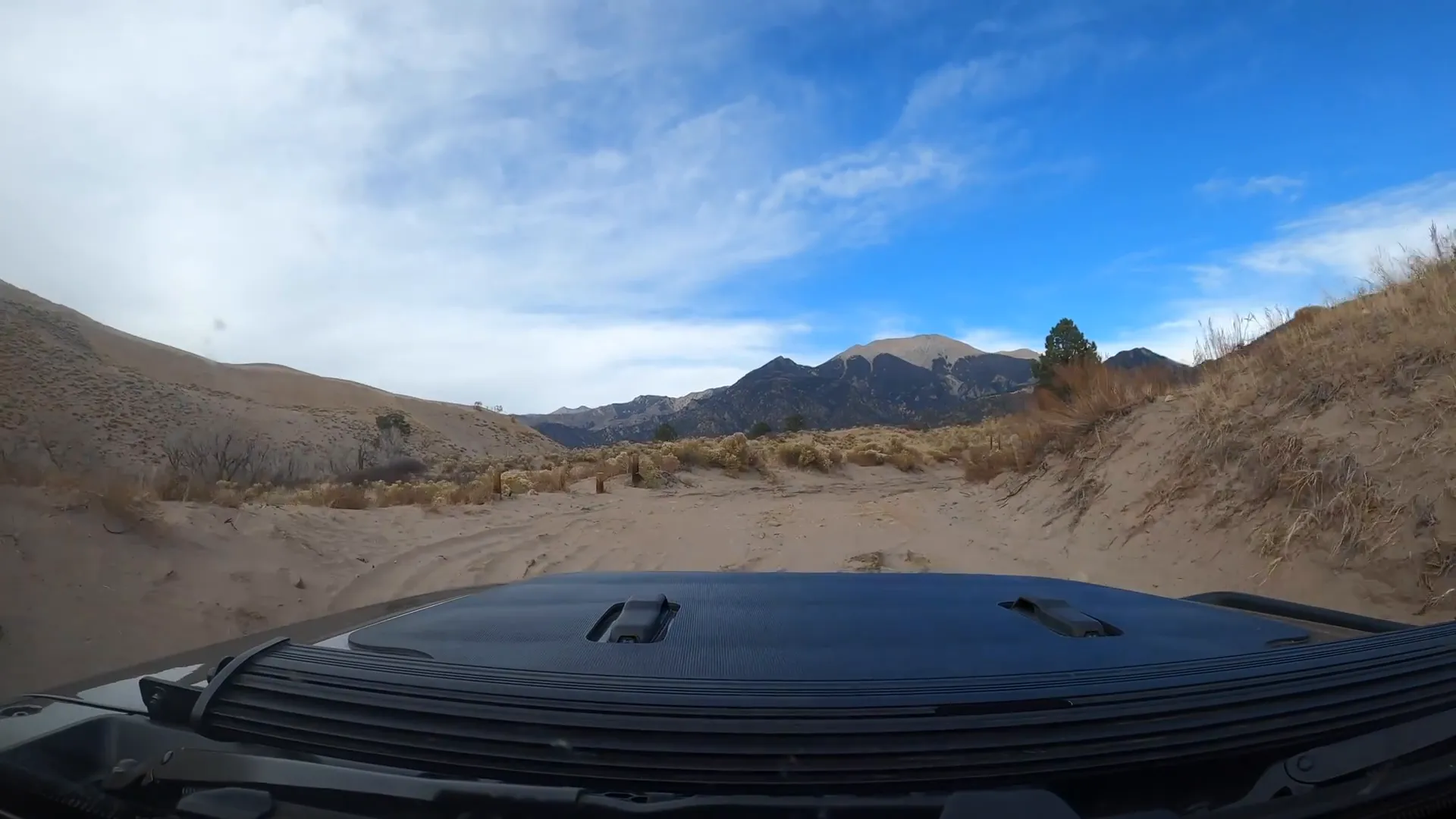 Climbing the sand dunes at Great Sand Dunes National Park