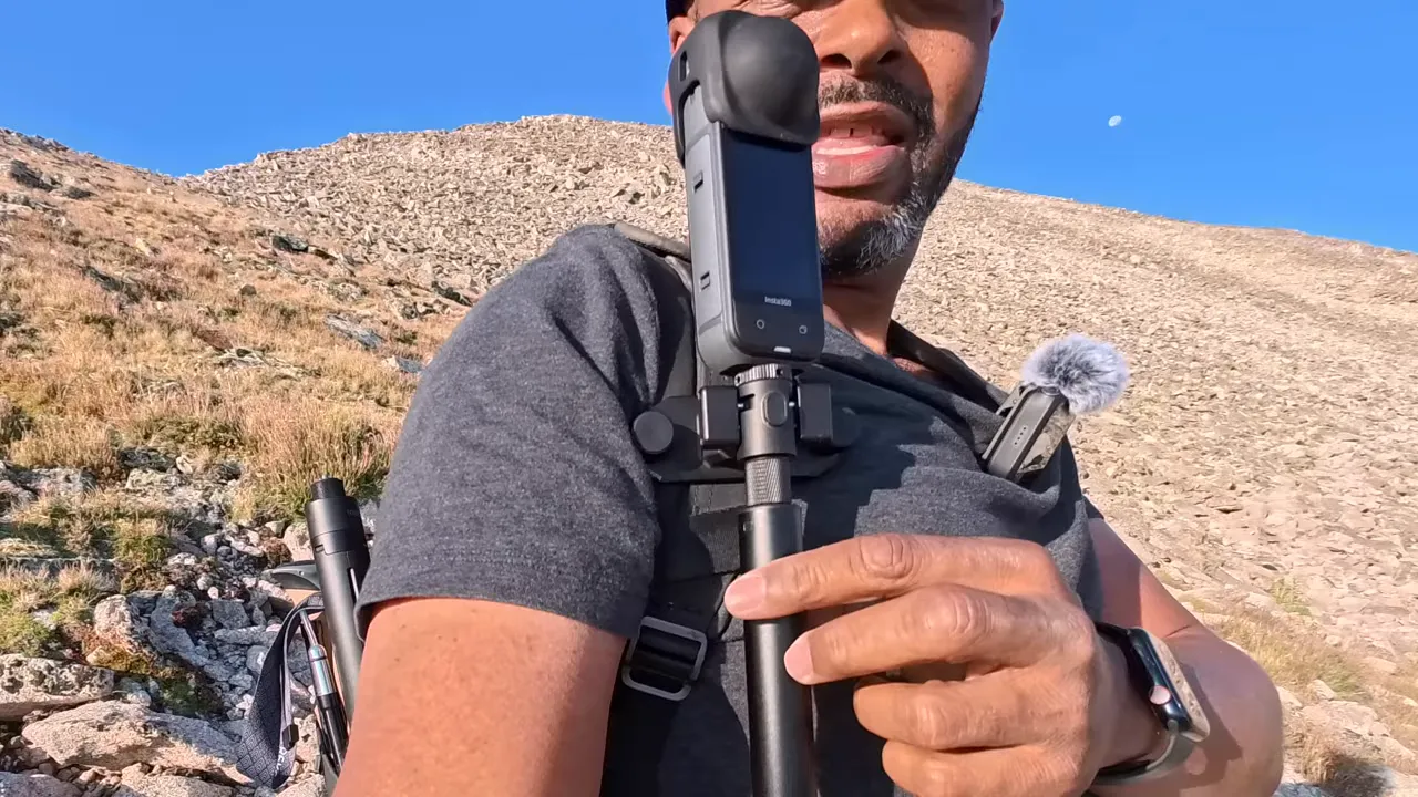 Magnetic holster holding the X5 on my pack