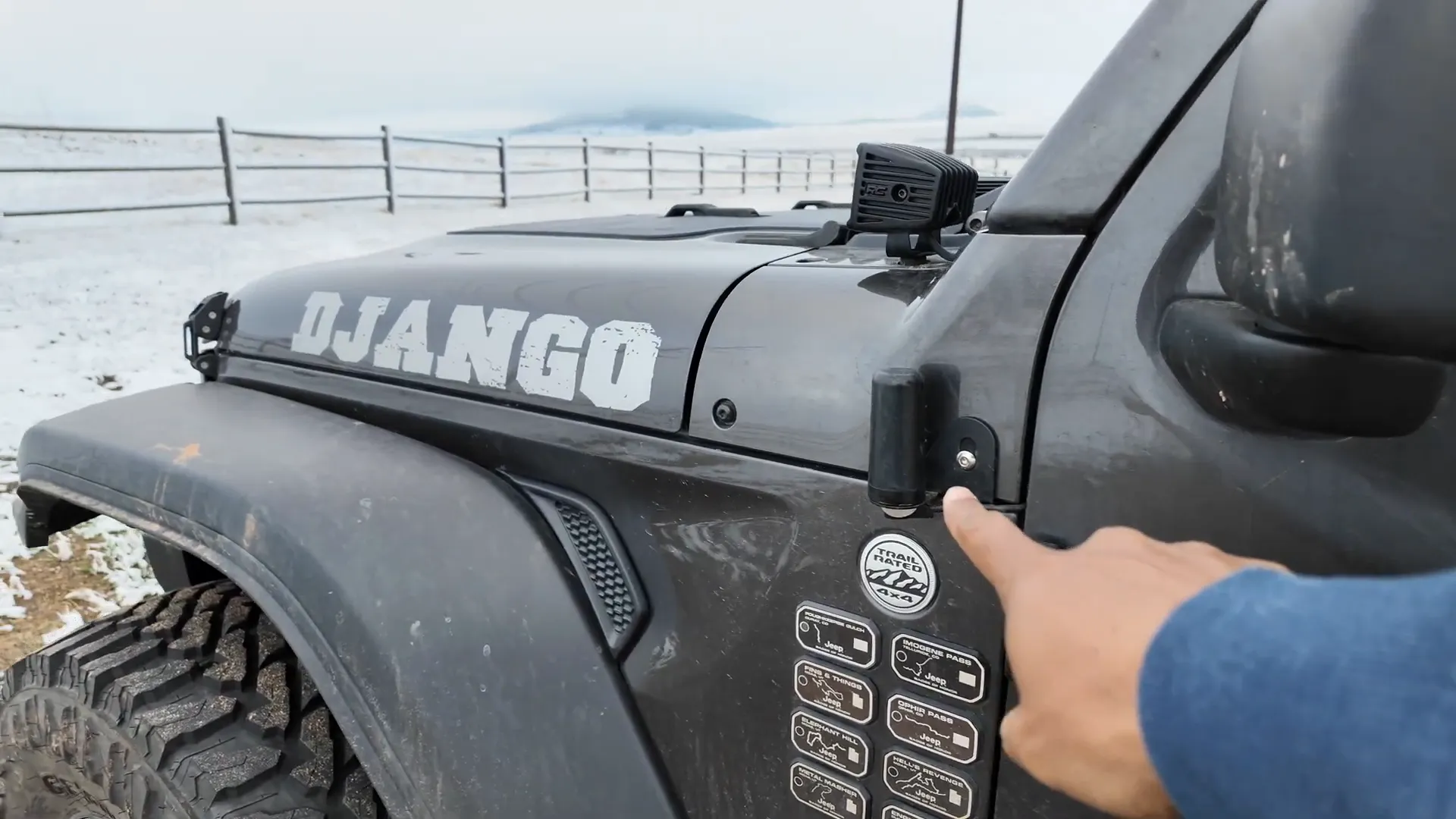GMRS radio antenna mounted under Jeep Gladiator dash