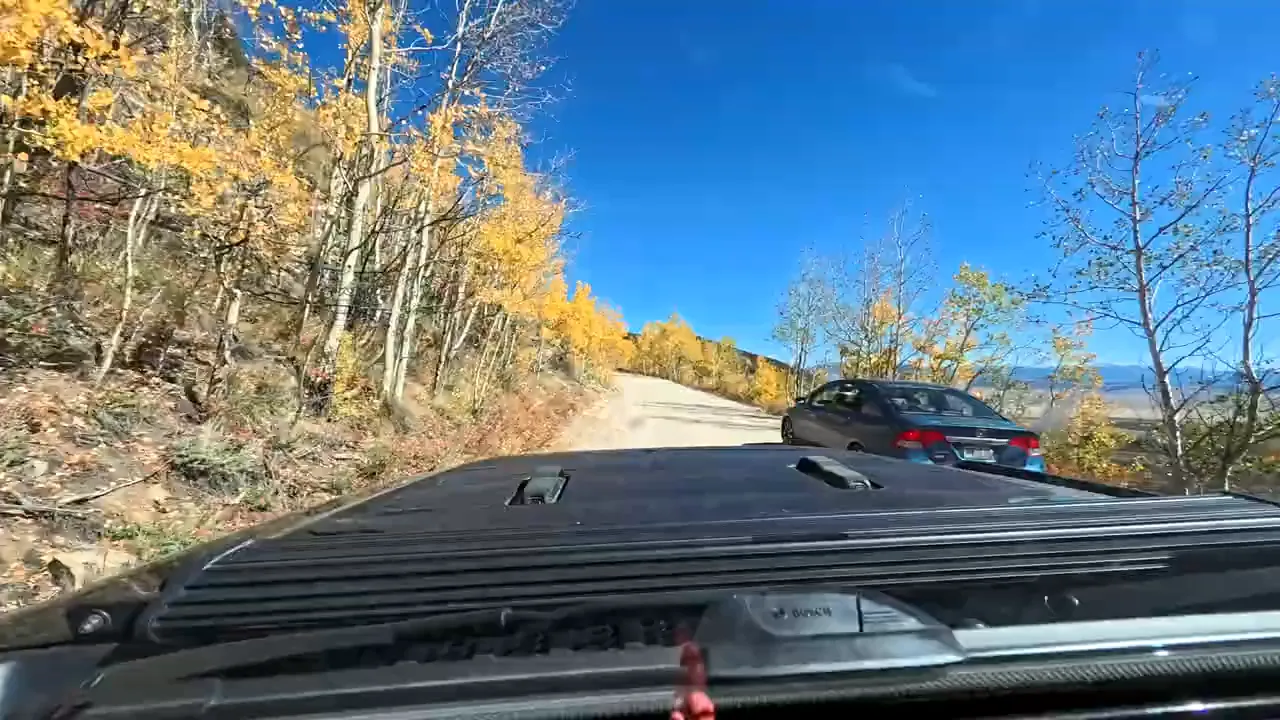 A late model Honda Civic driving the Boreas Pass road