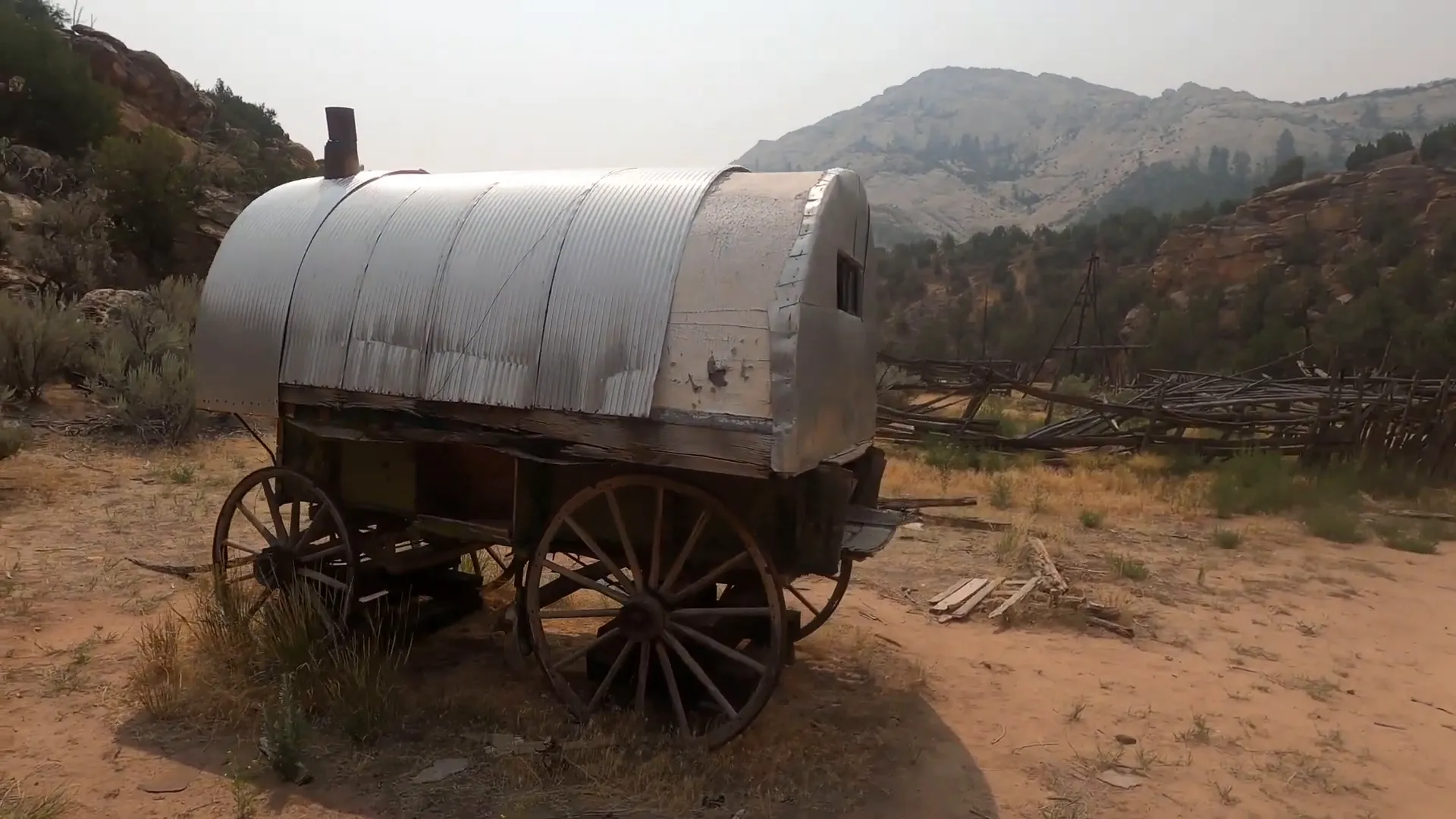 Old overlanding vehicle with kitchen and storage along Echo Park Road