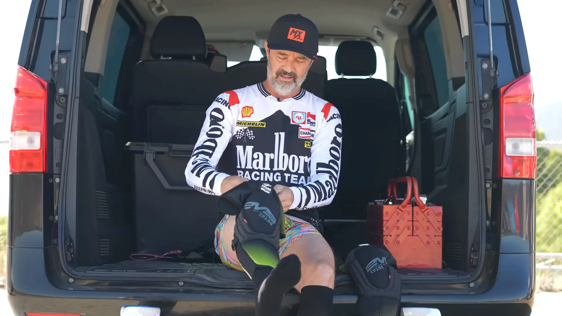 Putting on the EVS TP199 knee pad and checking fit