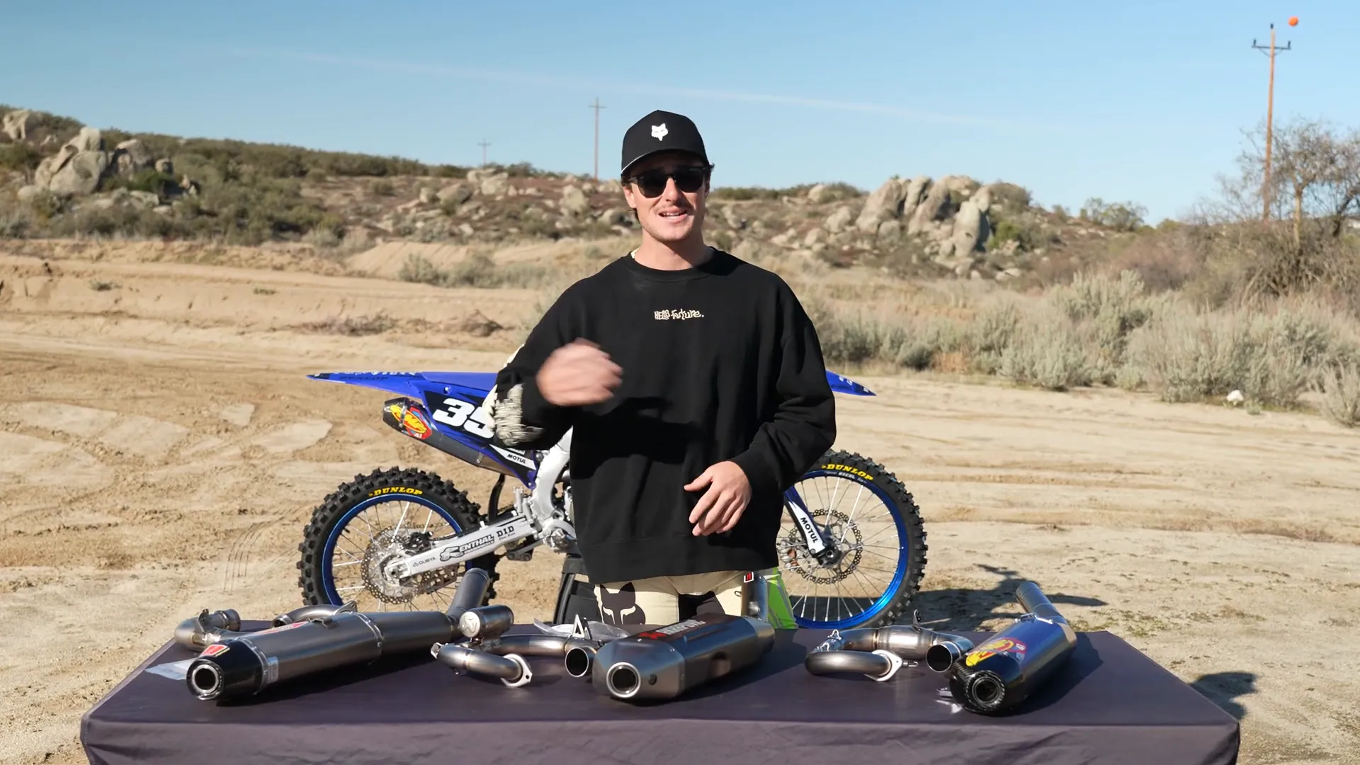 Yamaha YZ250F with titanium exhaust options laid out