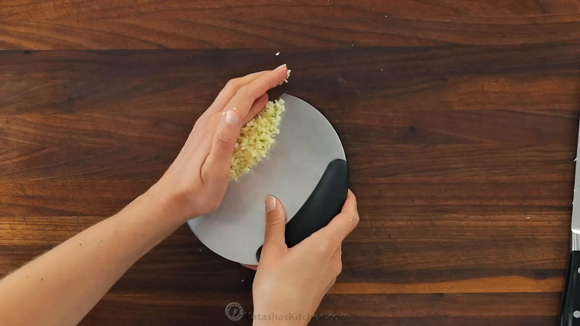Chopping sun-dried tomatoes
