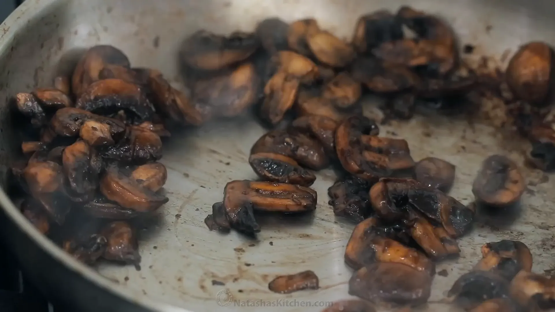 Adding mushrooms to skillet