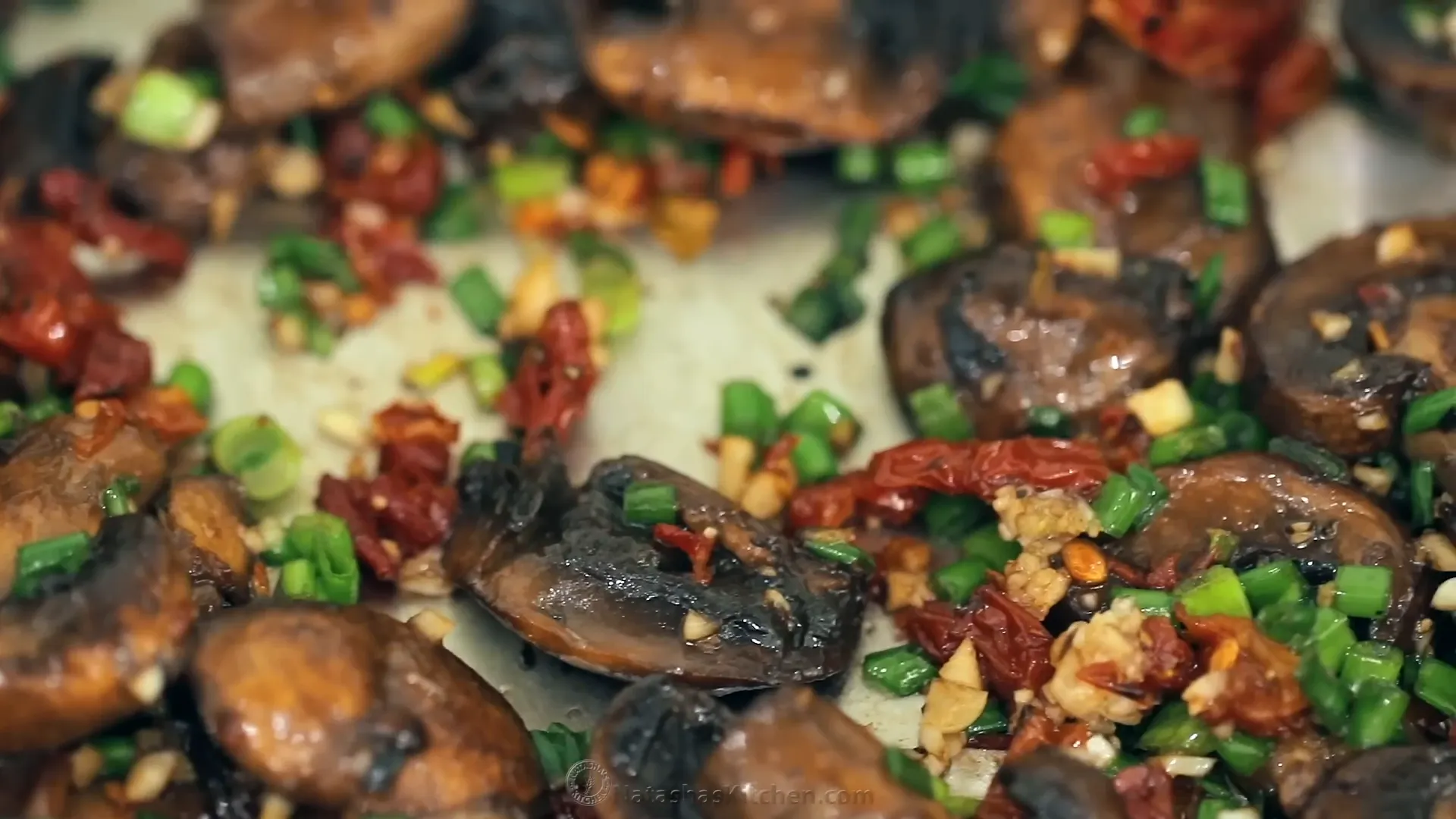 Adding vegetables to skillet