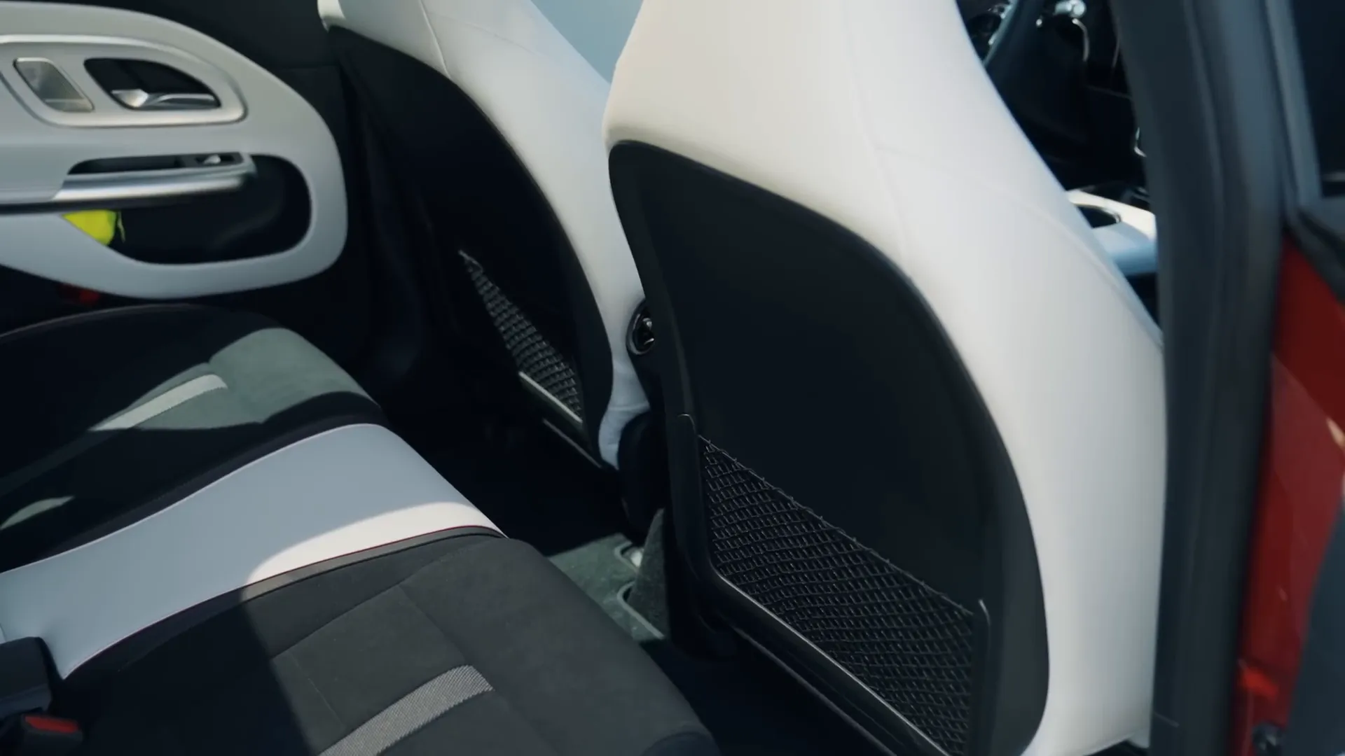 Mercedes CLA rear seats with white leather and red stitching