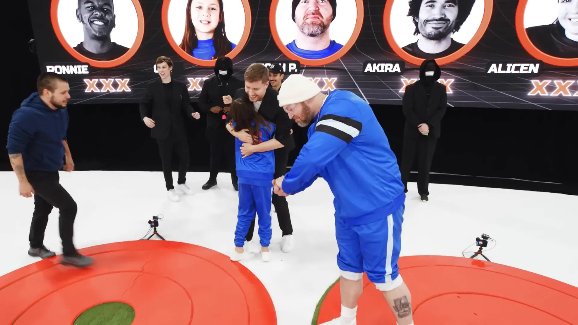 Gio celebrating his victory with his father after winning $500,000