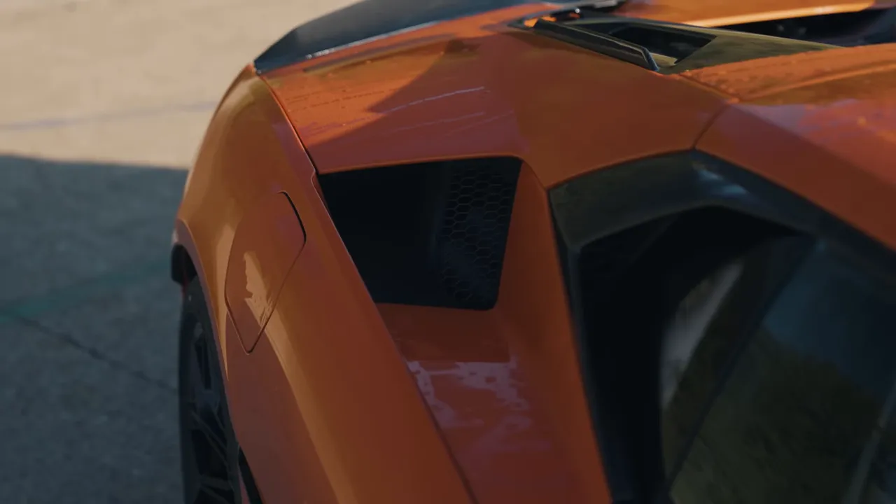 Profile and rear three-quarter shot highlighting the exposed rear wheel section