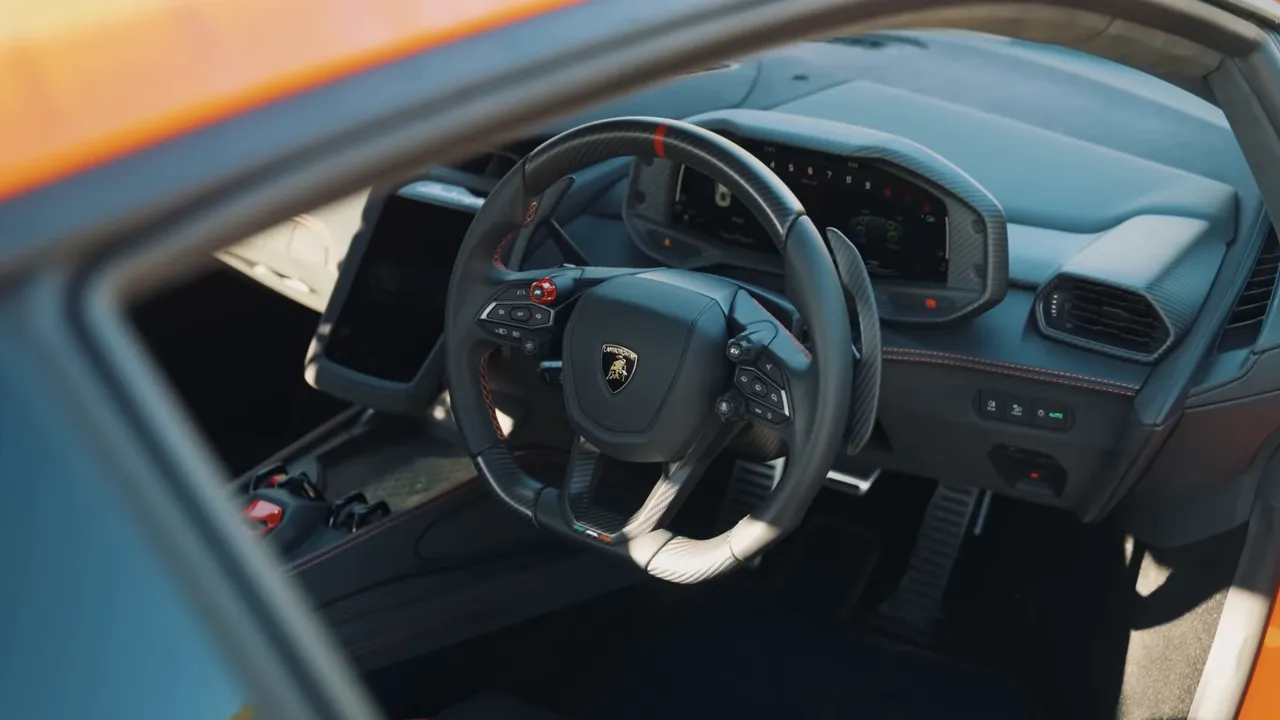 Interior three-display layout, floating centre console and start flap