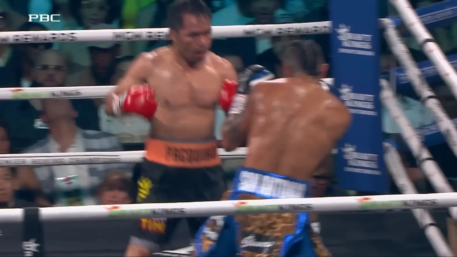Mario Barrios landing a combination on Manny Pacquiao