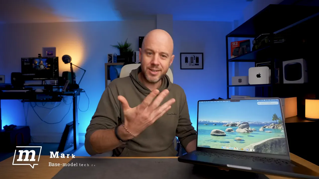 The M5 MacBook Pro in hand, looks similar to last year’s model