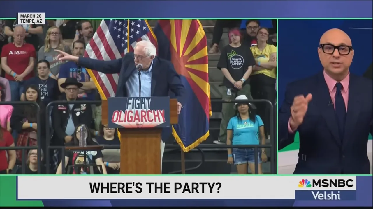Bernie Sanders speaking to a large crowd