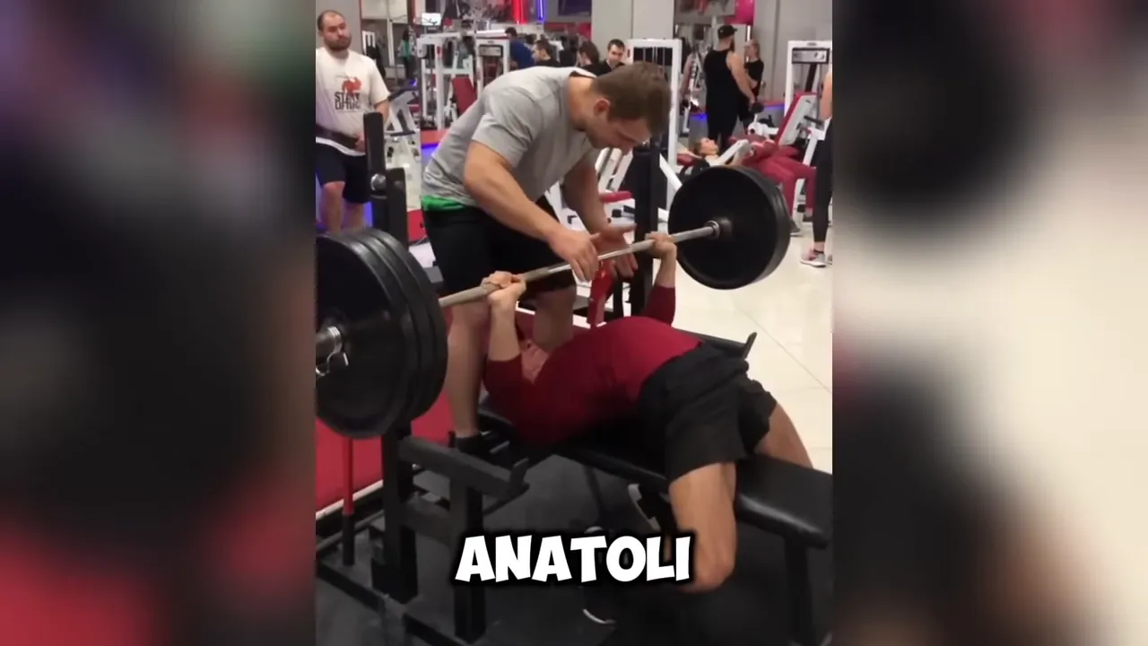 Anatoly bench pressing with focus