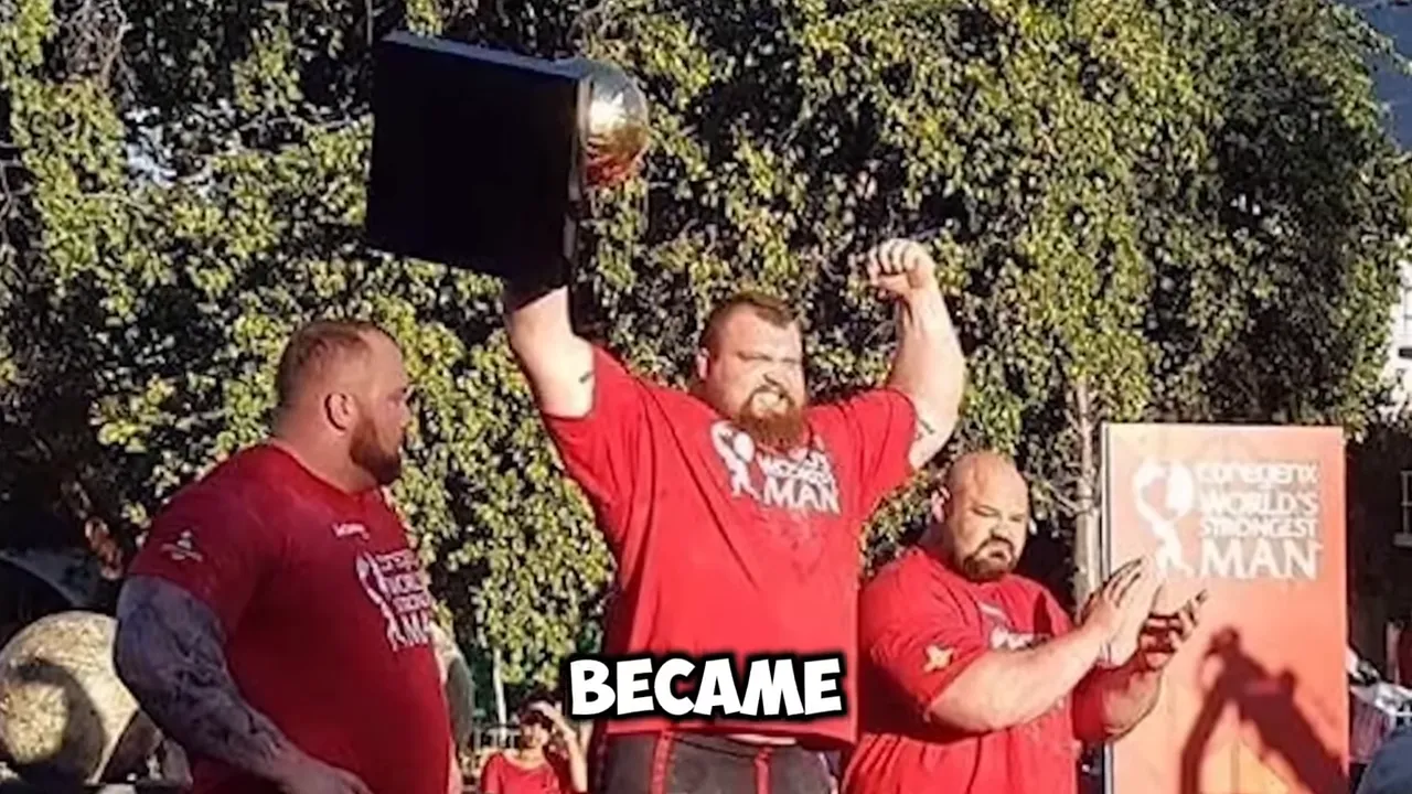Eddie Hall posing with his championship belt
