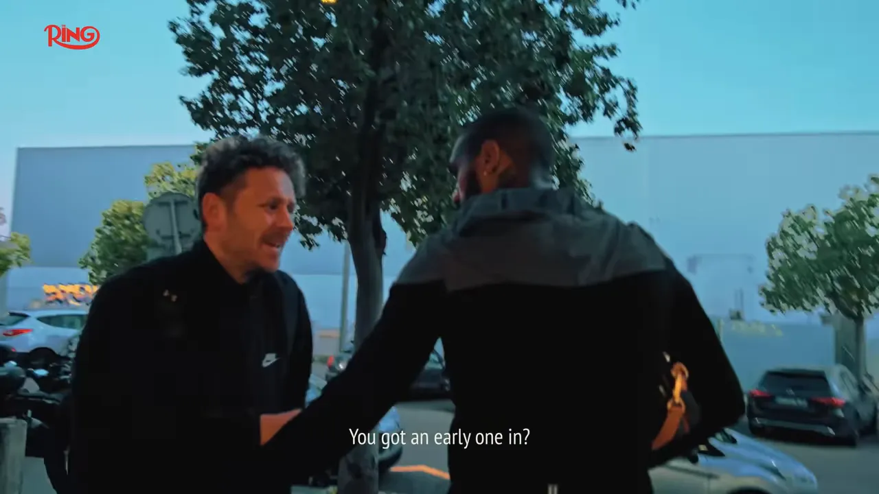 Conor greeting a teammate after an early morning run