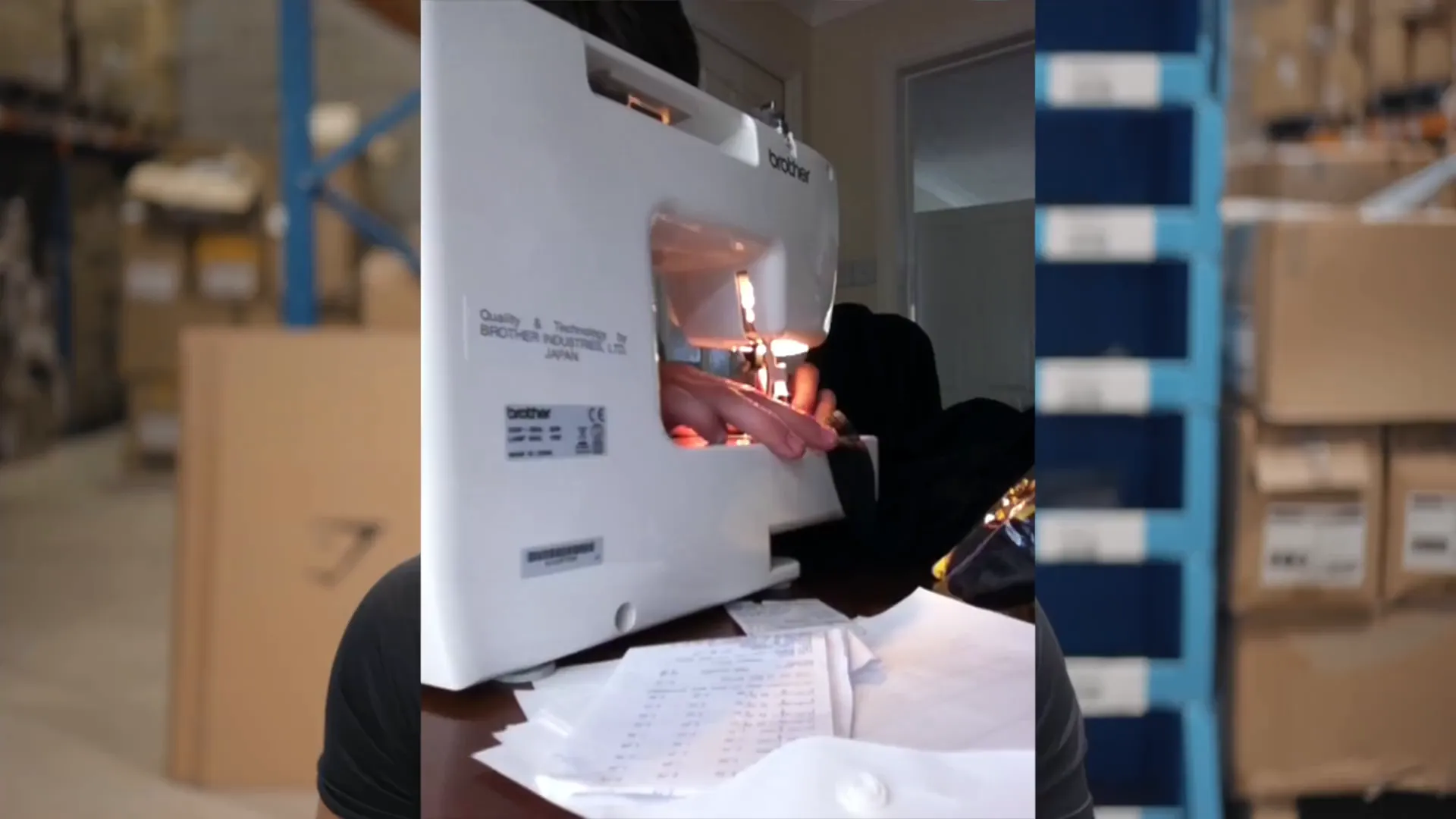 Ben printing and sewing Gymshark t-shirts manually