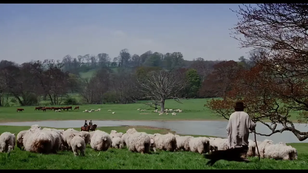 Wide pastoral scene from Sense and Sensibility showing a shepherd, flock, and riders by a pond