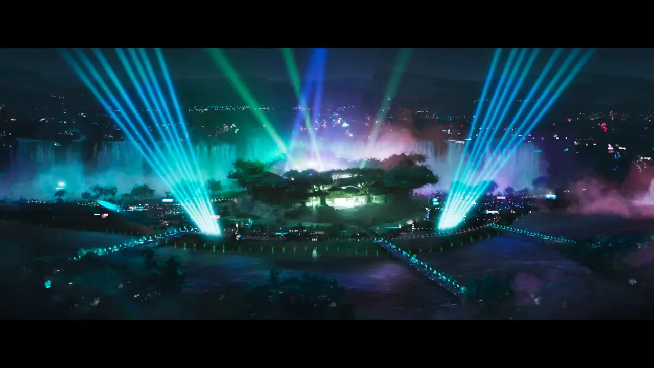aerial shot of neon-lit arena with spotlights and central island for roarball