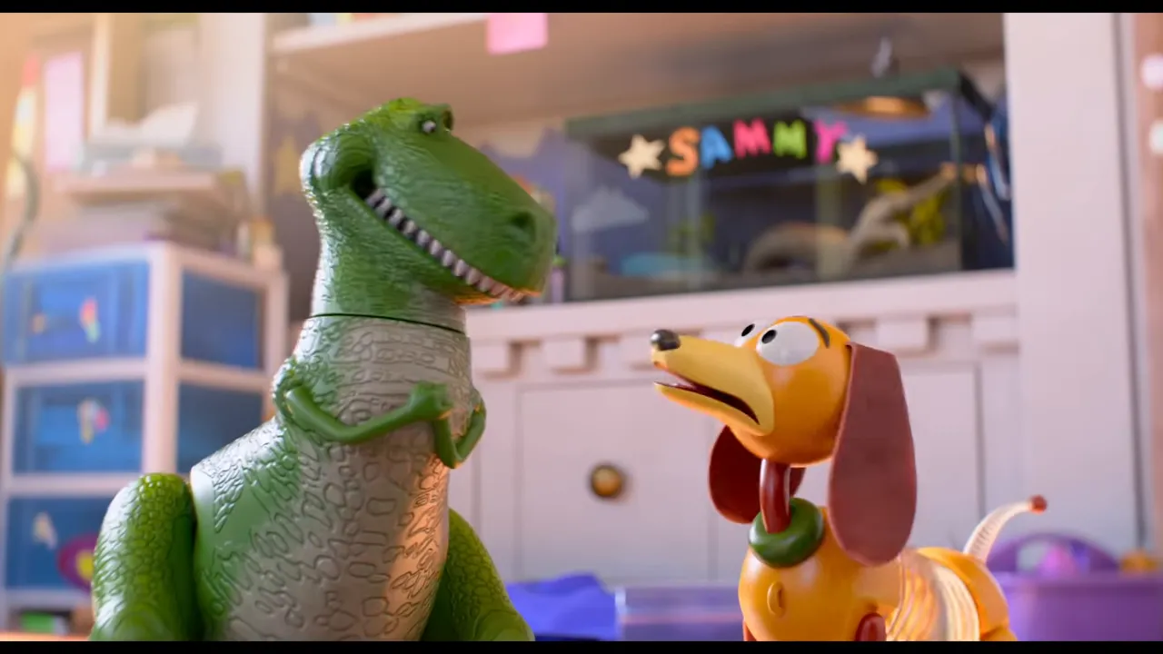 Rex and Slinky toy dog looking at each other in a child's playroom with toy shelf in background