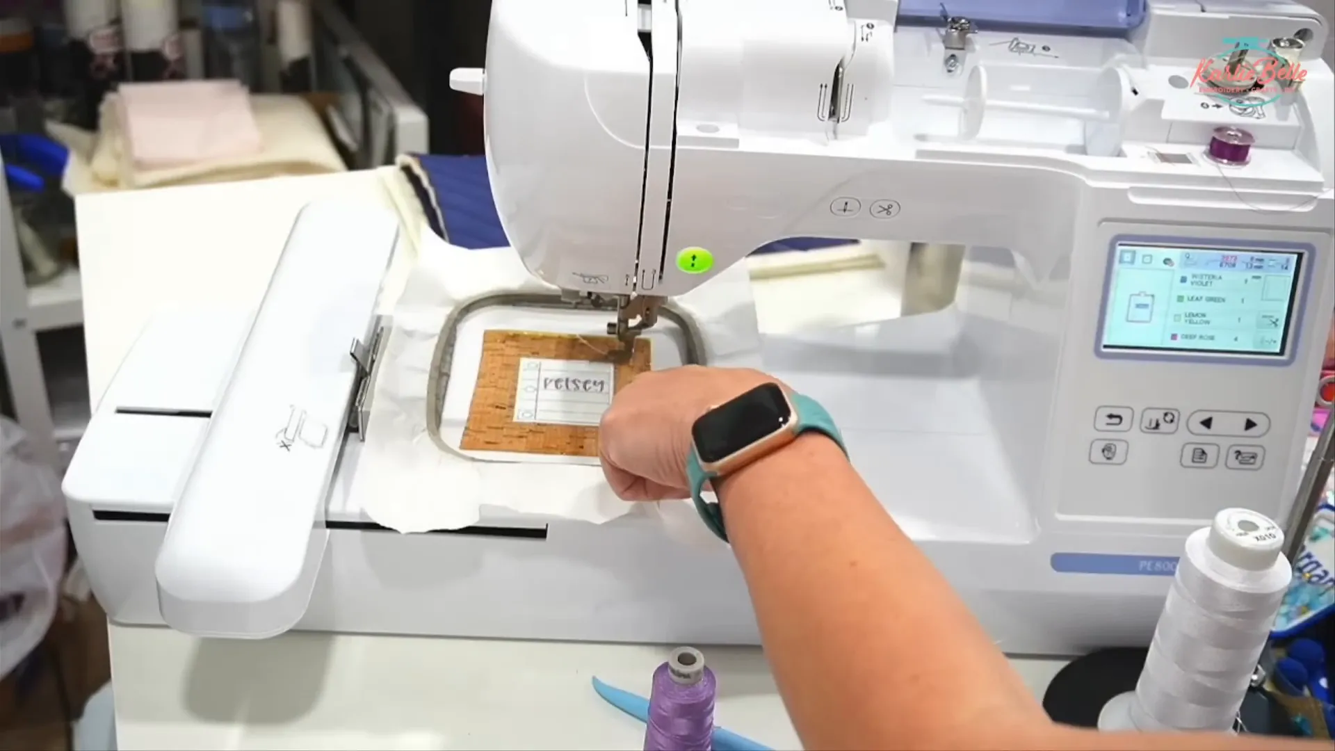 clear vinyl is tacked down partially to create an open pocket for confetti inside the Machine Embroidered Name Tag.