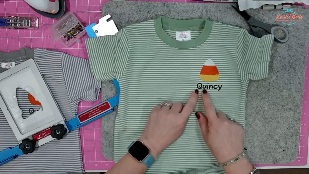 Finished embroidered shirt with stripe lined up under name
