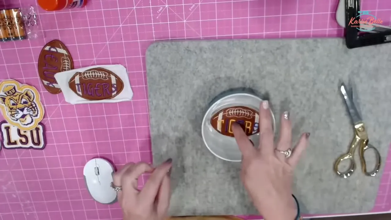 Dissolving wash-away stabilizer in water to reveal clean patch edge