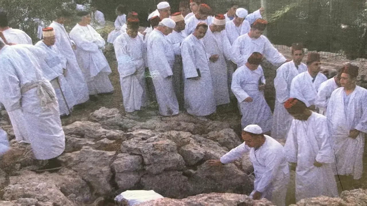 Samaritan men dressed in white gathering outdoors for Passover
