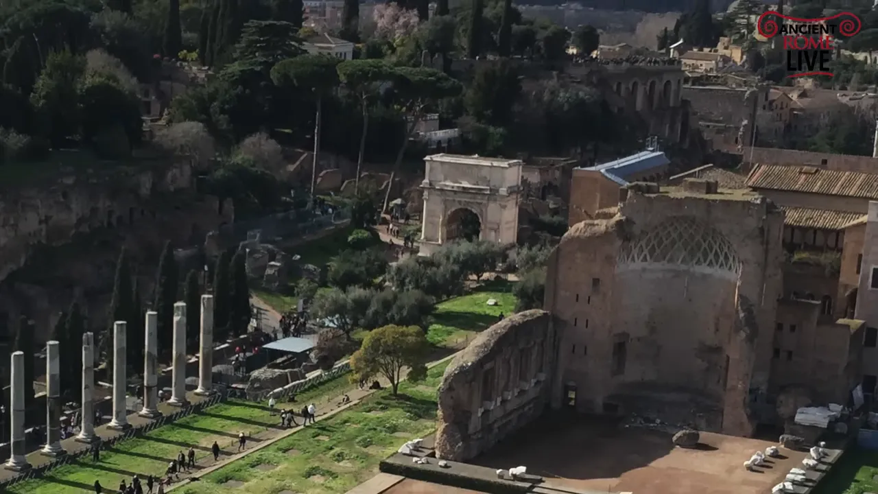 Aerial view of the Arch of Titus near the Roman Forum and Palatine ruins