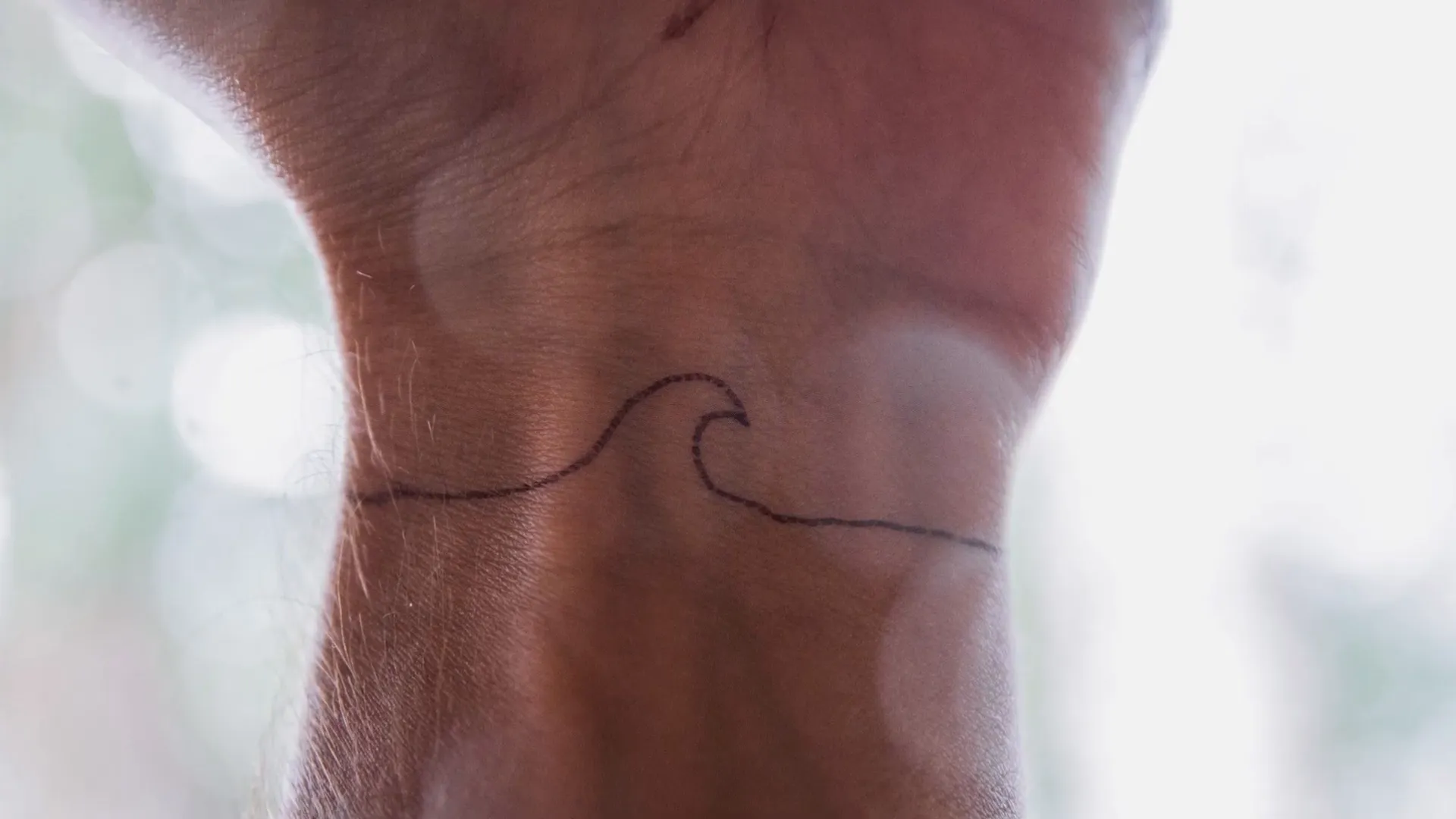 Wave tattoo example