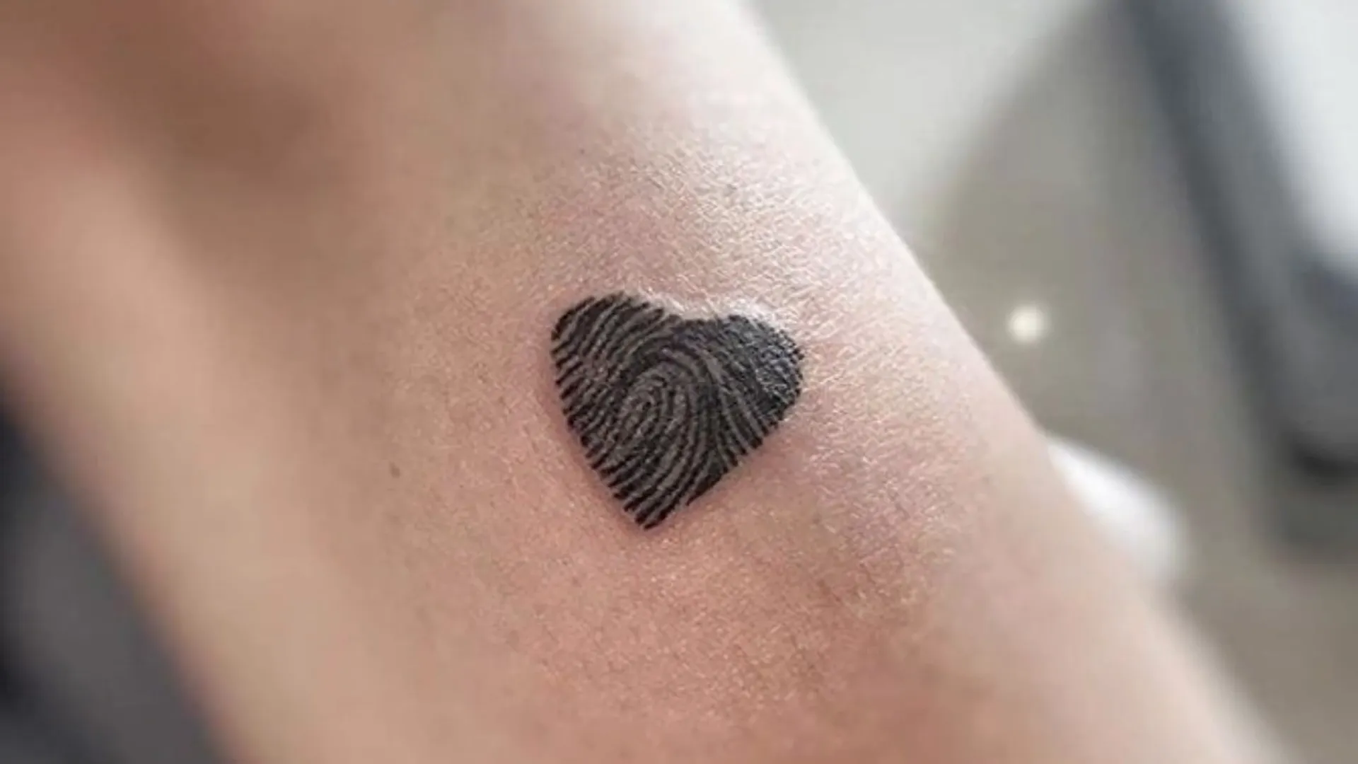 Fingerprint tattoo design