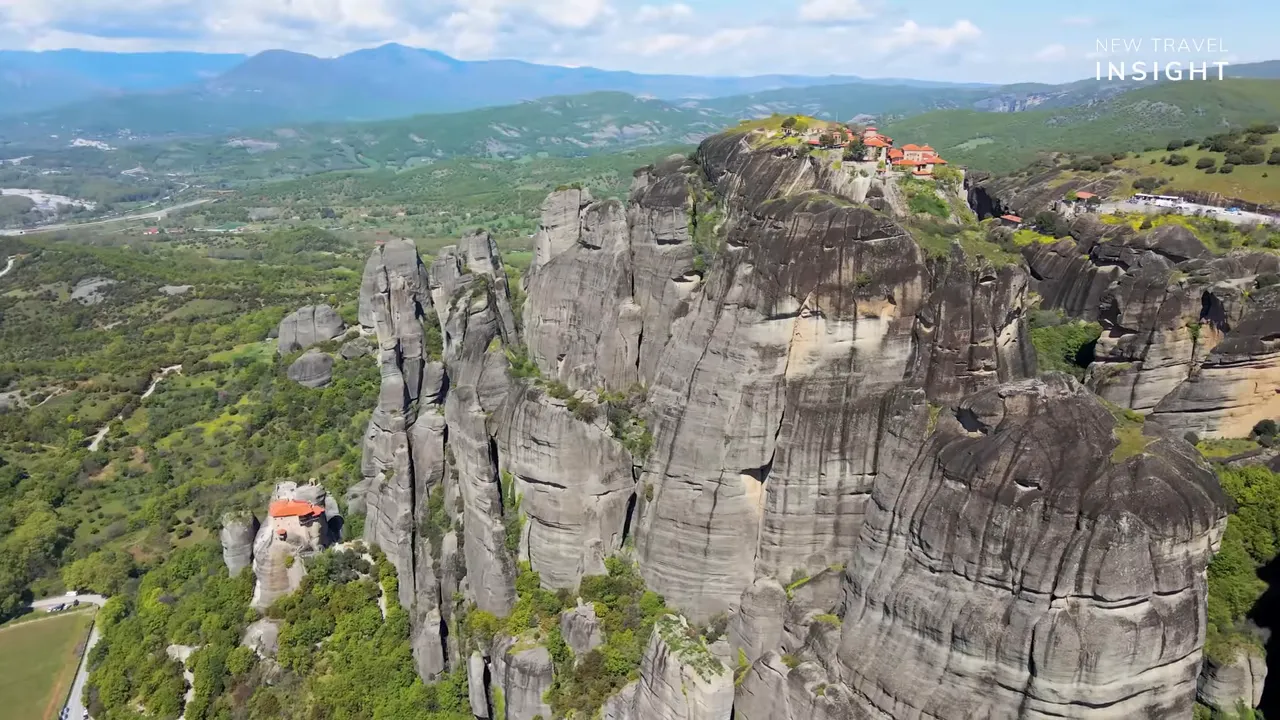 Meteora rock towers with monasteries along the cliff edge in Greece